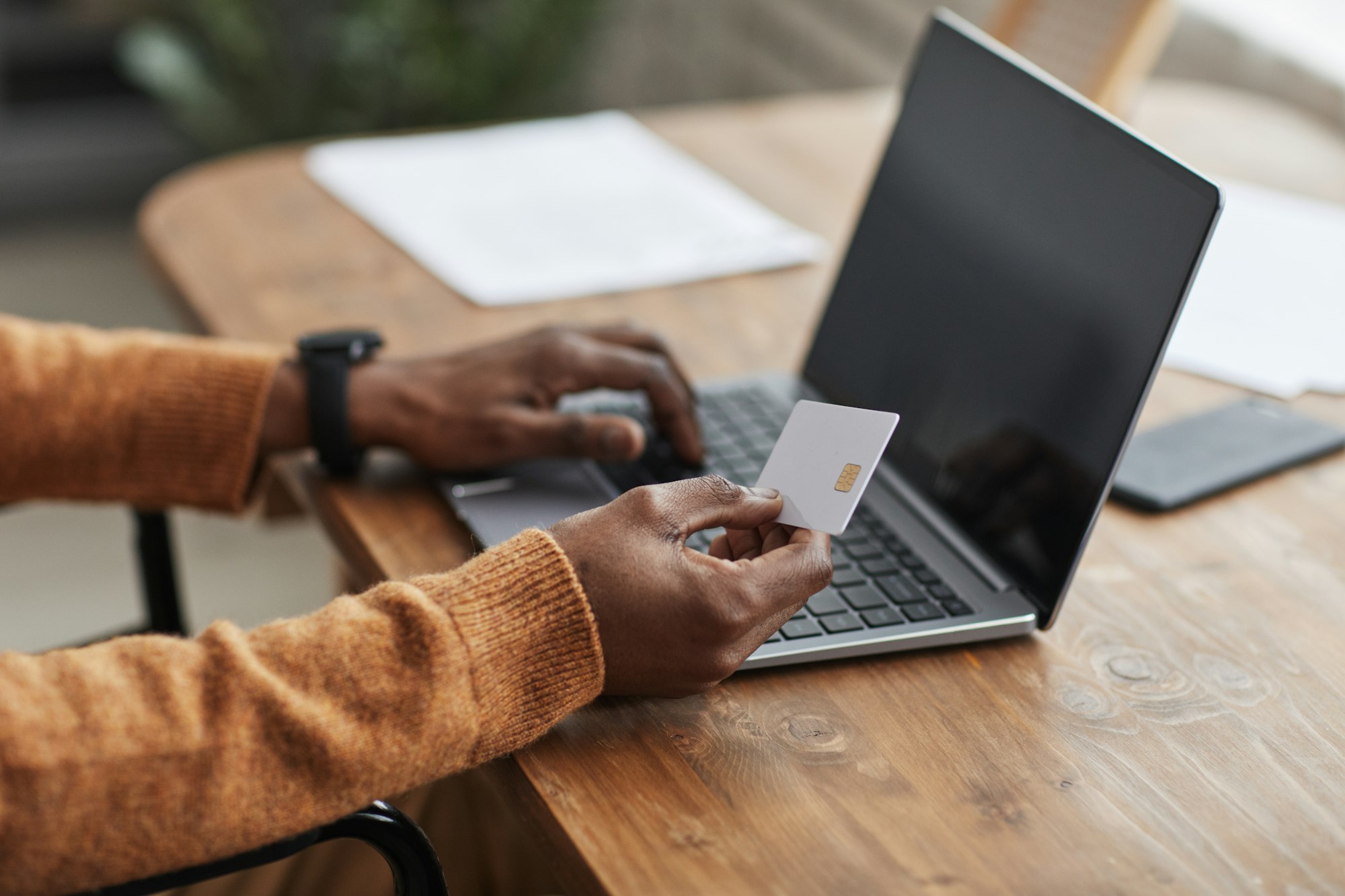 African American Man paying Online